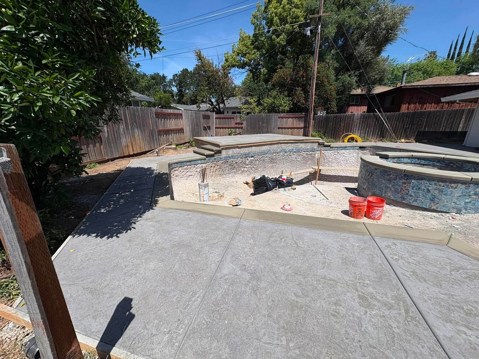 Spa and stamped concrete deck