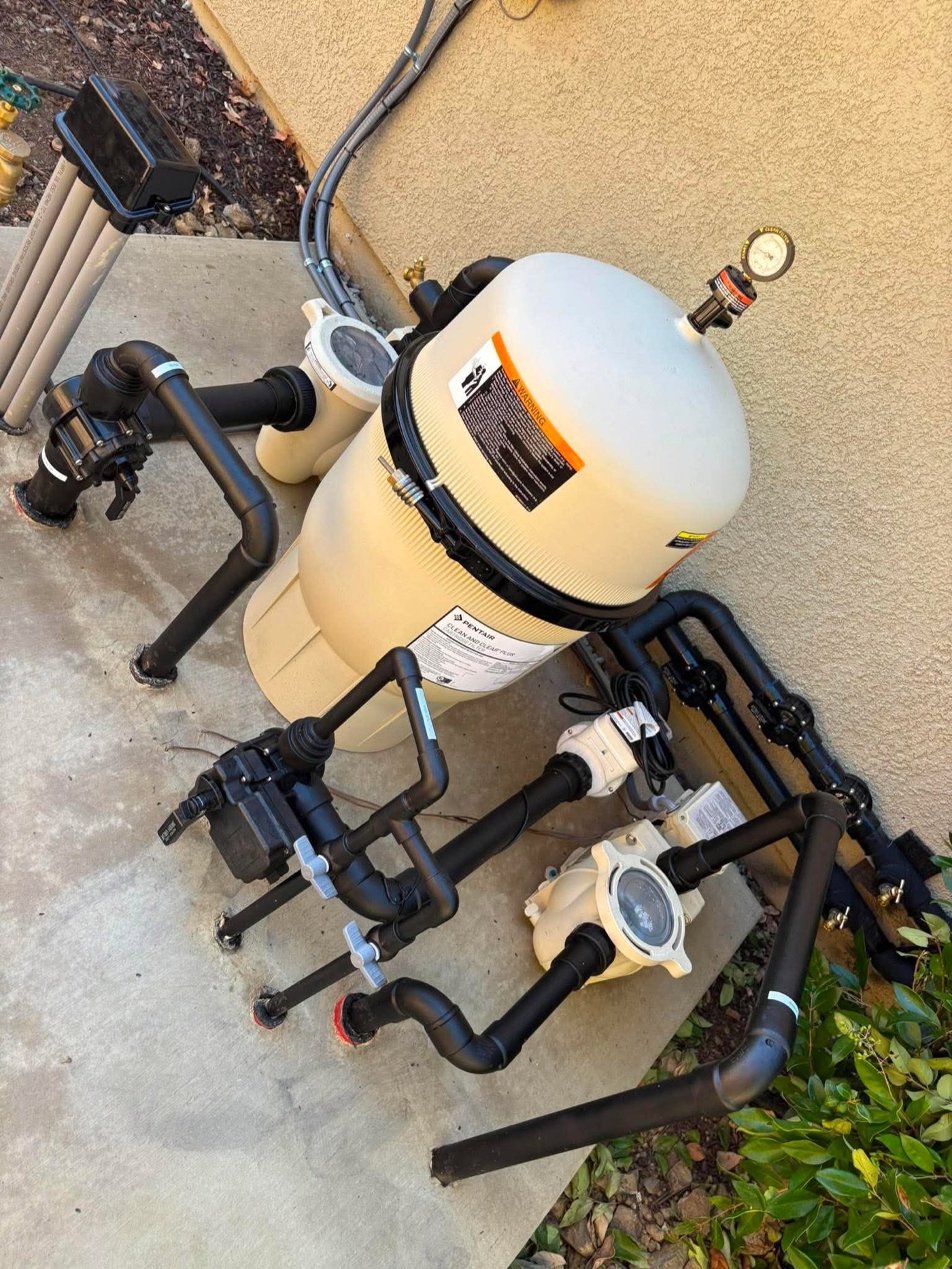 Pool filter and pump on an equipment pad