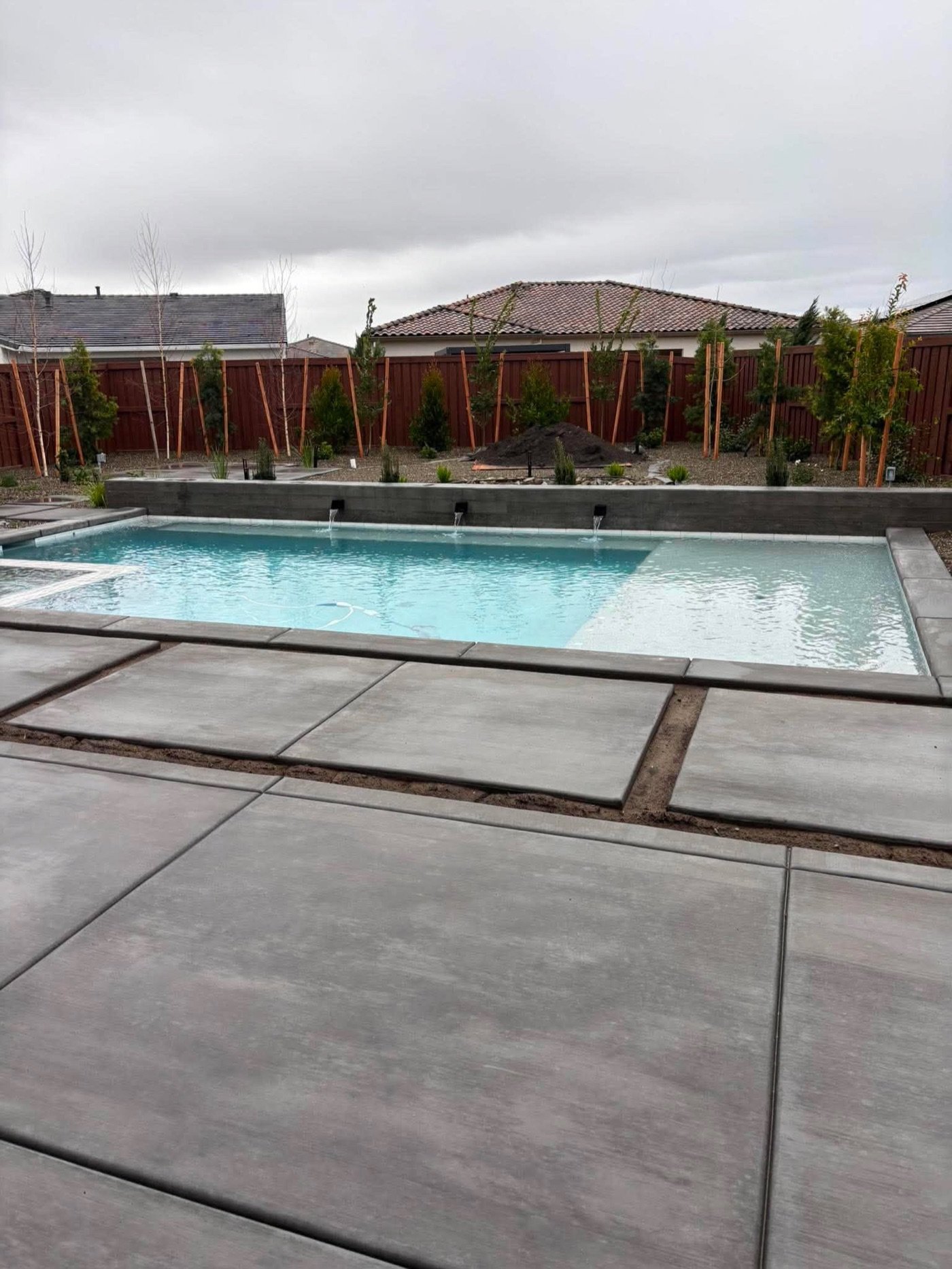 Poured concrete pool decking