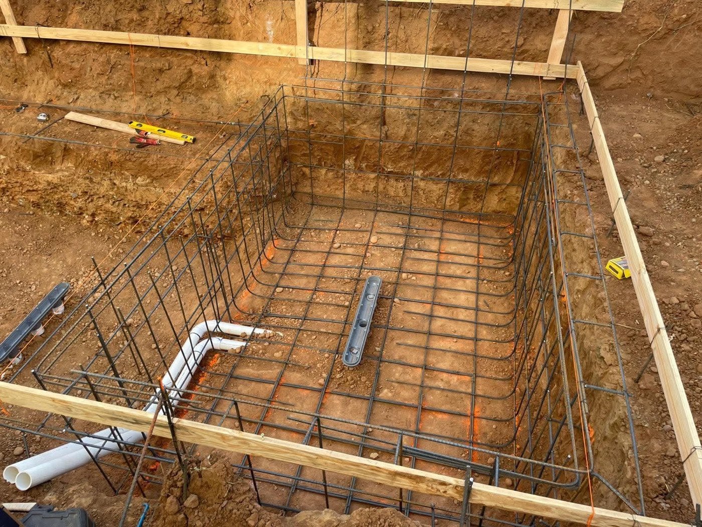 Steel and plumbing mid-build
