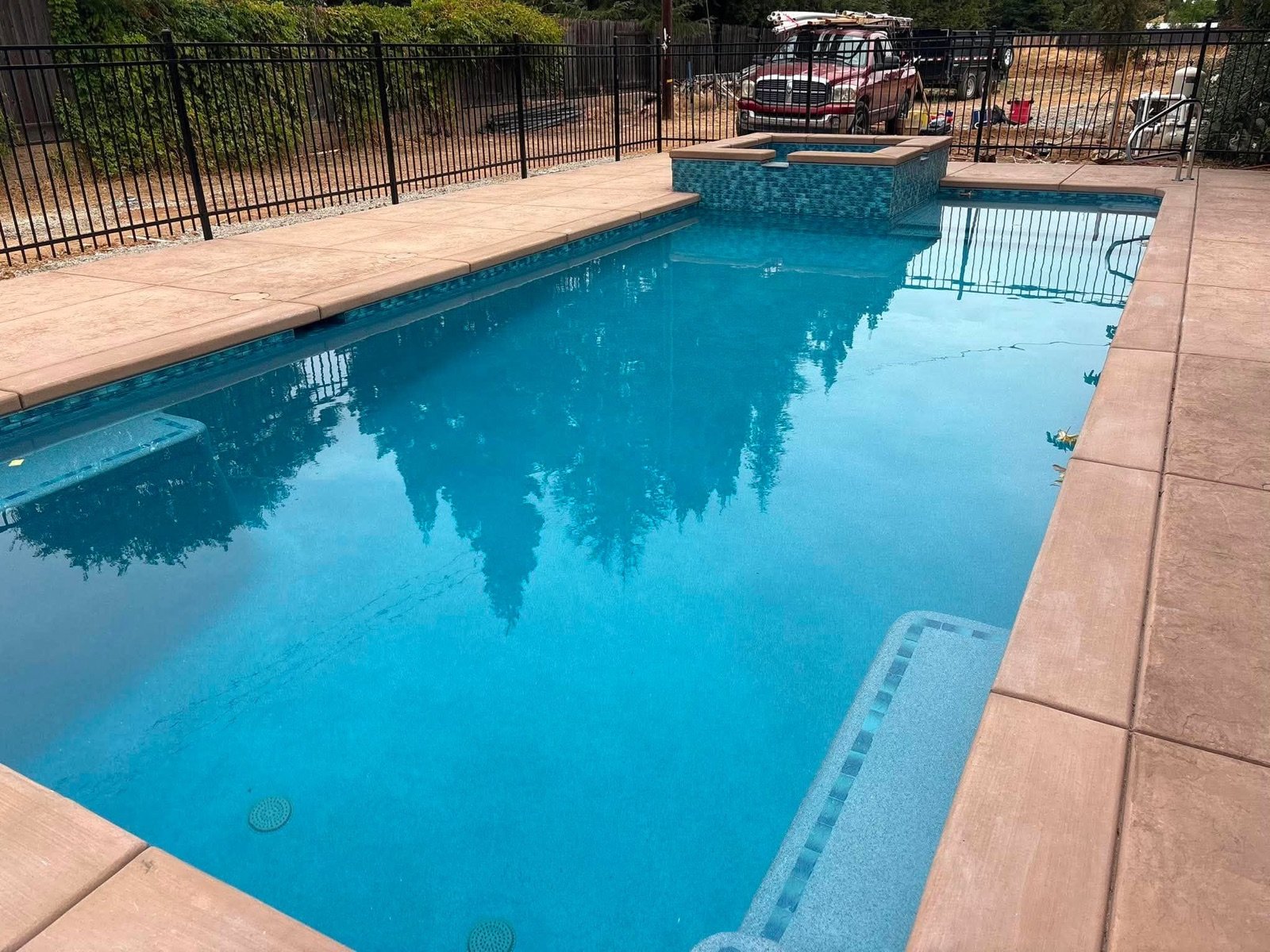 Family pool with brick coping