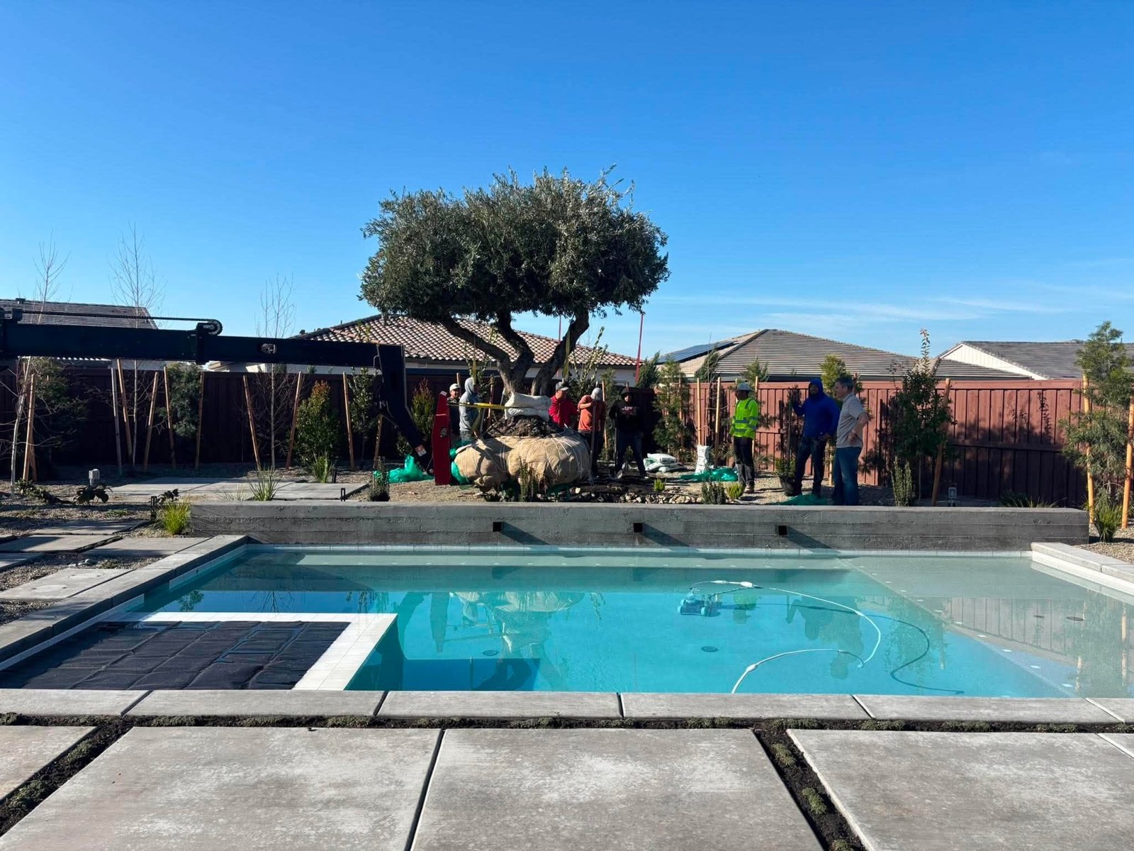 US Custom Pools & Spas crew at a finished project
