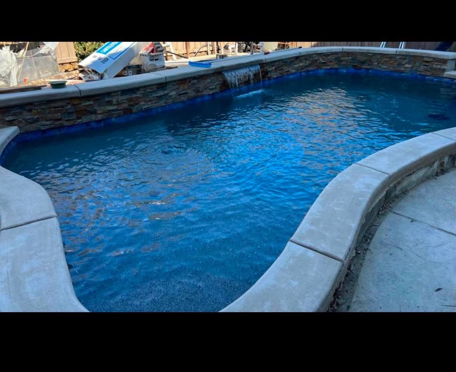 Freeform pool with a dark interior